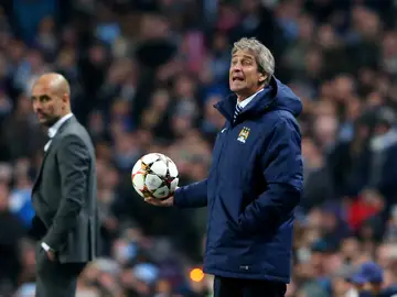 Manuel Pellegrini junto a Pep Guardiola, en un encuentro de Champions League Manuel Pellegrini junto a Pep Guardiola, en un encuentro de Champions League