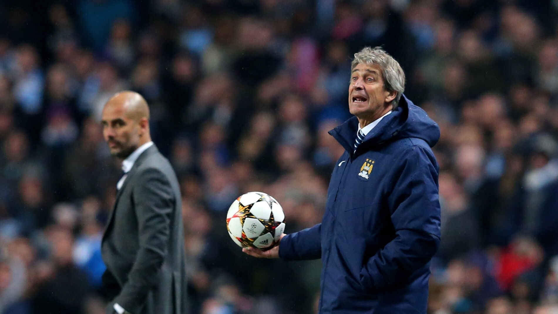 Manuel Pellegrini junto a Pep Guardiola, en un encuentro de Champions League