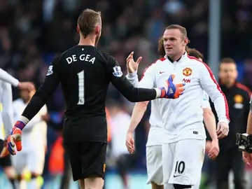 De Gea y Rooney saludándose antes de un partido De Gea y Rooney saludándose antes de un partido