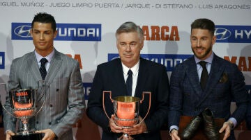 Ancelotti junto a Cristiano y Ramos