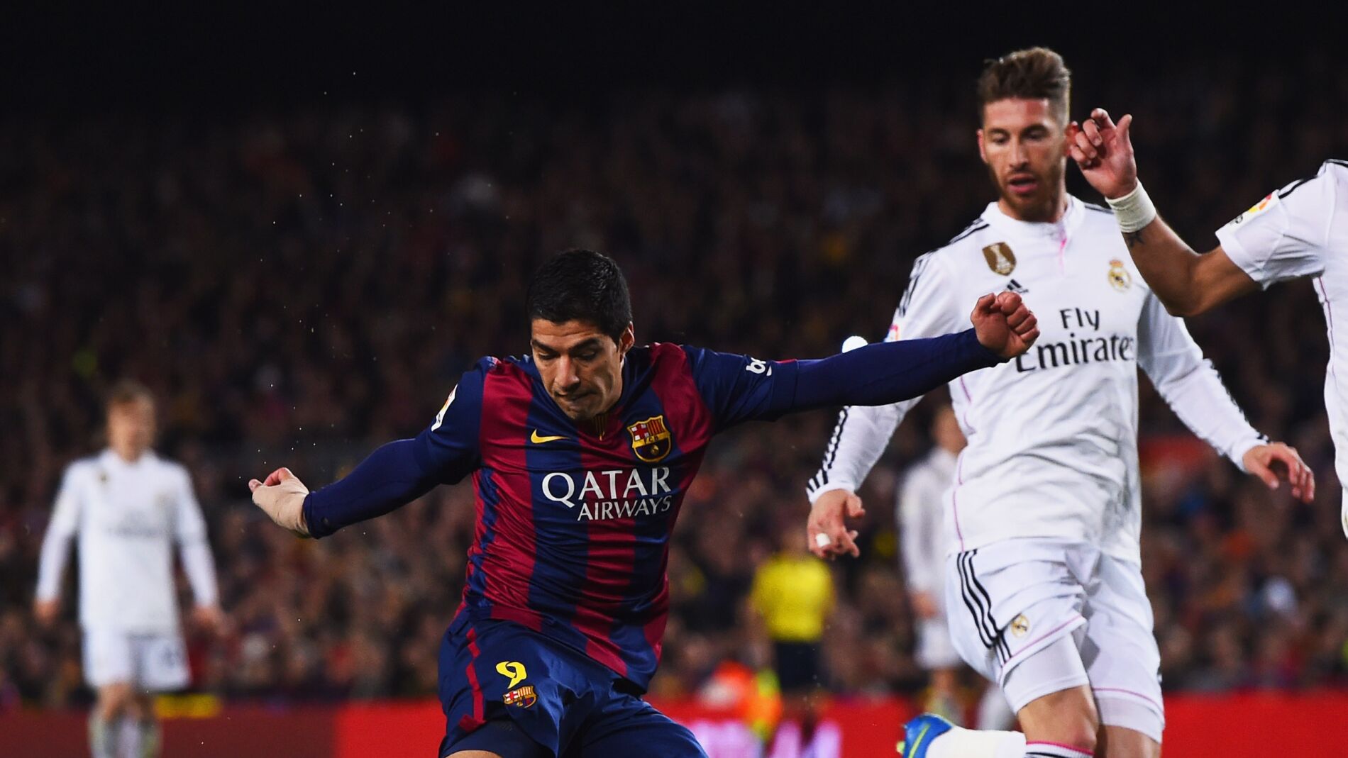 Luis Suarez y Sergio Ramos durante un Cl&aacute;sico
