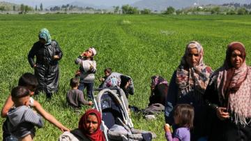 Refugiados en el campamento en la frontera entre Grecia y Macedonia