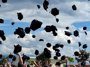 Imagen de archivo de un acto de graduación Imagen de archivo de un acto de graduación