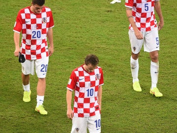 Luka Modric, Mateo Kovacic y Vedran Corluka después del encuentro con Croacia