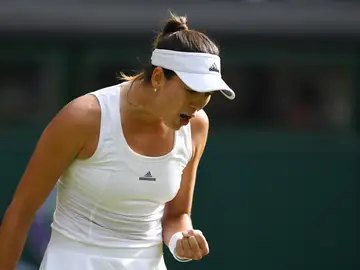 Muguruza celebra un punto ante Camila Giorgi Muguruza celebra un punto ante Camila Giorgi
