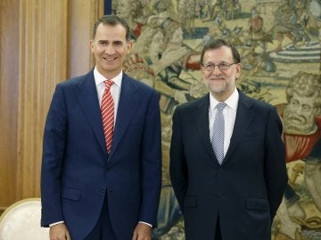 Mariano Rajoy junto al Rey Felipe VI