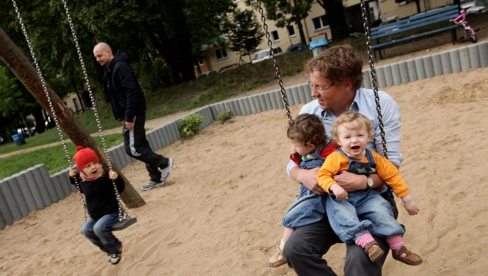 Padre con sus hijos