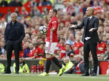 Pique entre Guardiola y Rooney Pique entre Guardiola y Rooney