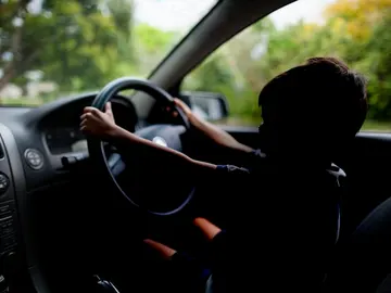 Un niño conduciendo un coche (Archivo) Un niño conduciendo un coche (Archivo)