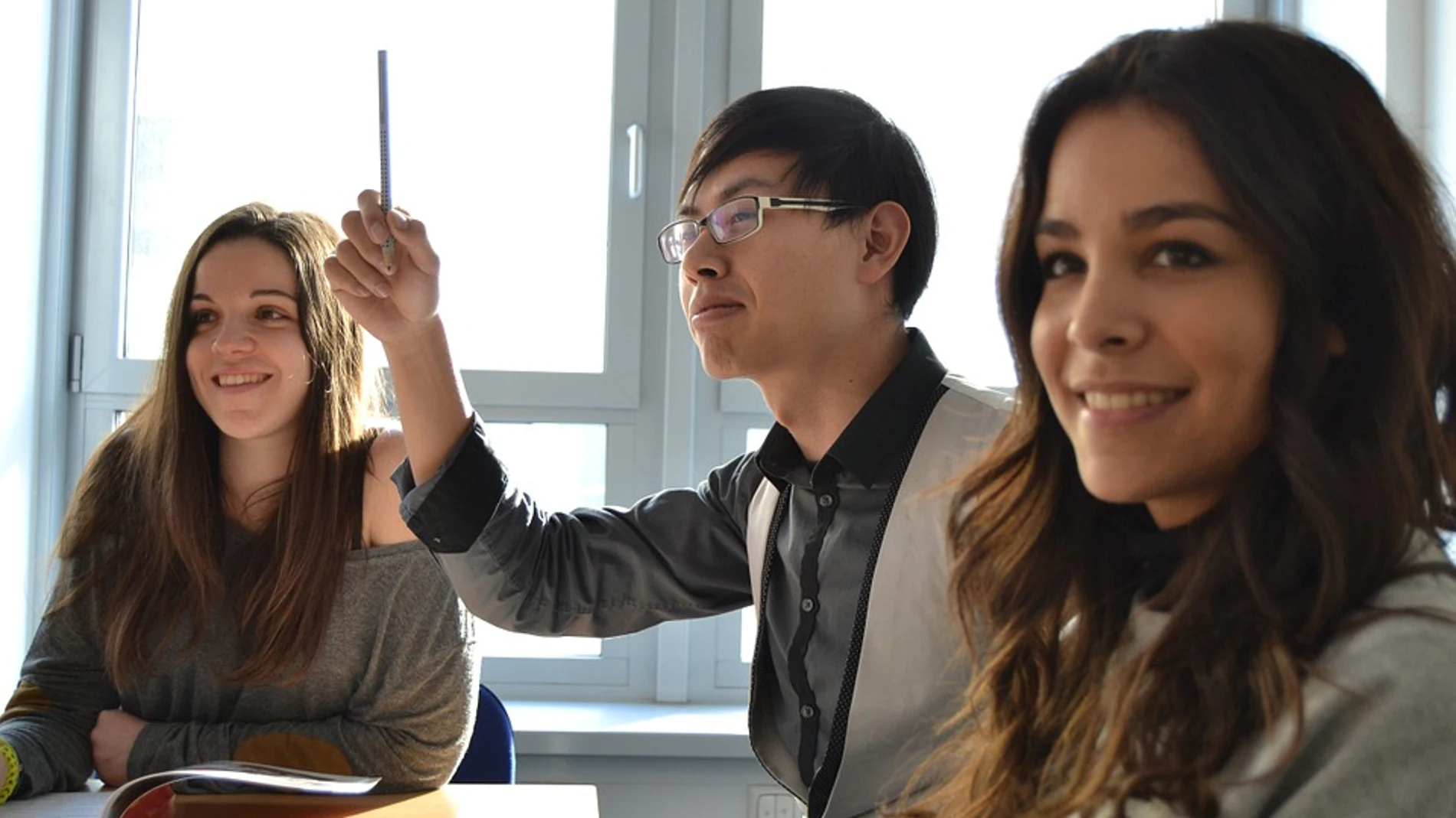 Estudiantes en clase Estudiantes en clase