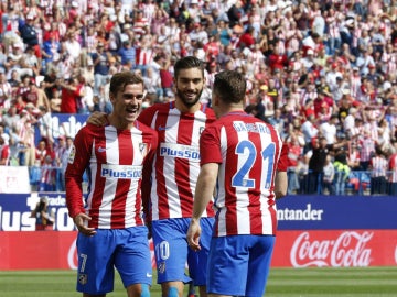 Gameiro, Griezmann y Carrasco celebran un gol