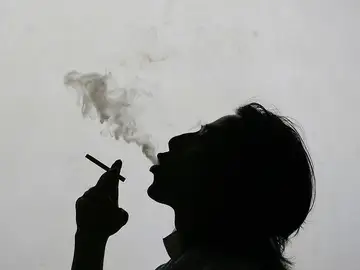 Una fumadora Una fumadora