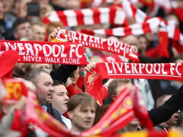 Aficionados del Liverpool durante un partido Aficionados del Liverpool durante un partido