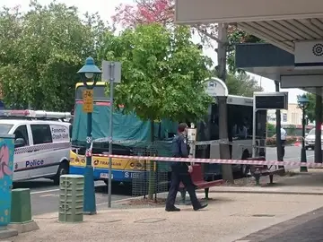 Vista de la zona acordonada donde se produjo el ataque a un conductor de autobuses en un barrio de Brisbane Vista de la zona acordonada donde se produjo el ataque a un conductor de autobuses en un barrio de Brisbane