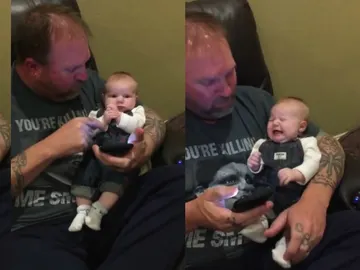 Imagen del bebé rockero y su padre Imagen del bebé rockero y su padre