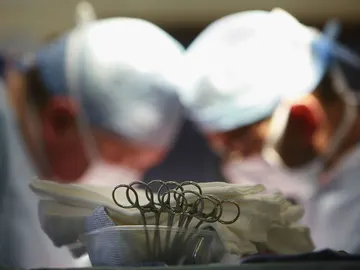 Cirujanos en un quirófano Cirujanos en un quirófano