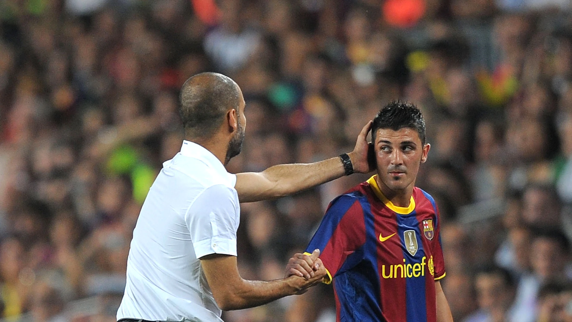 Villa y Guardiola se dan la mano Villa y Guardiola se dan la mano