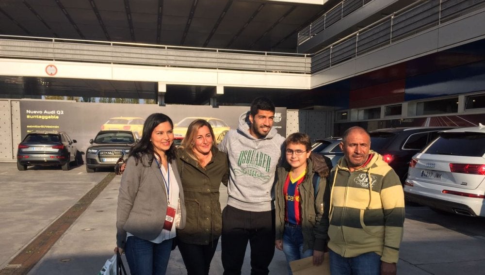 Luis Suárez junto a Imad