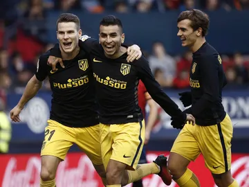 Gameiro, Correa y Griezmann celebran un gol Gameiro, Correa y Griezmann celebran un gol