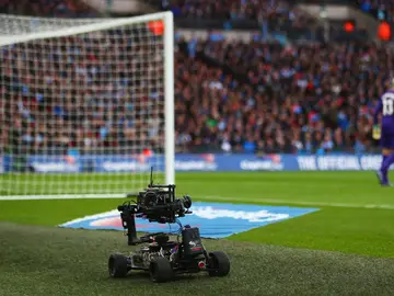 Cámara en un partido de fútbol Cámara en un partido de fútbol