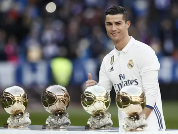Cristiano, con sus cuatro Balones de Oro Cristiano, con sus cuatro Balones de Oro