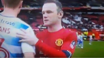 Rooney y George Evans al terminar el partido