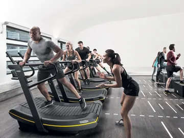 Máquina de correr en grupo Máquina de correr en grupo