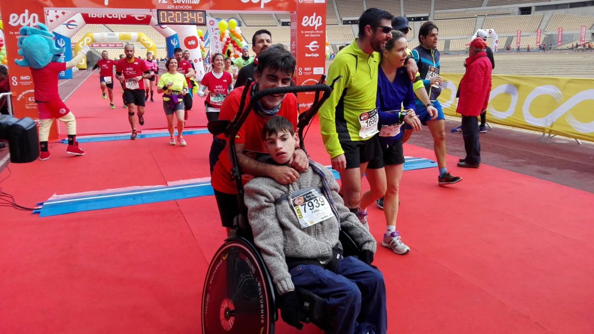 José Manuel Roas y su hijo en una maratón José Manuel Roas y su hijo en una maratón