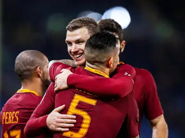 Los jugadores de la Roma celebrando un gol Los jugadores de la Roma celebrando un gol