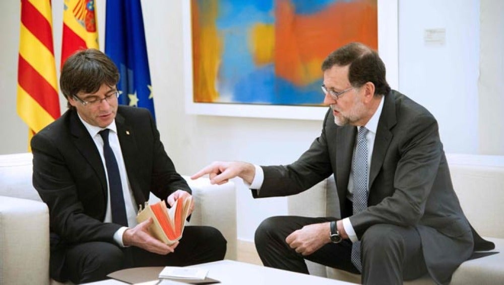 Mariano Rajoy y Carles Puigdemont