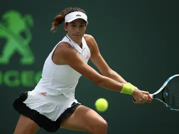 Muguruza golpea una bola Muguruza golpea una bola