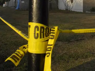 Imagen de archivo de una cinta policial Imagen de archivo de una cinta policial