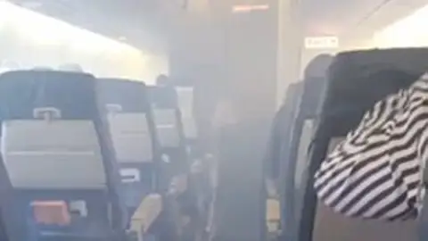 Humo en avión Humo en avión