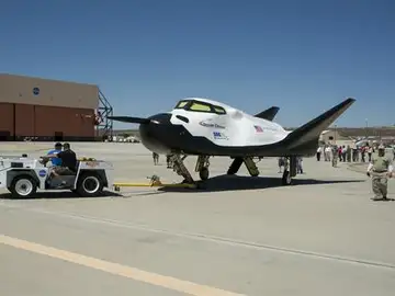 La nave espacial Dream Chaser, que desarrolla la empresa privada estadounidense Sierra Nevada, y con la que Naciones Unidas lanzará en 2021 su primera misión espacial. La nave espacial Dream Chaser, que desarrolla la empresa privada estadounidense Sierra Nevada, y con la que Naciones Unidas lanzará en 2021 su primera misión espacial.