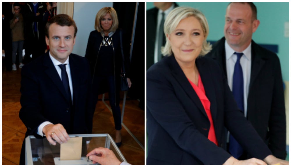 Macron y Le Pen votando