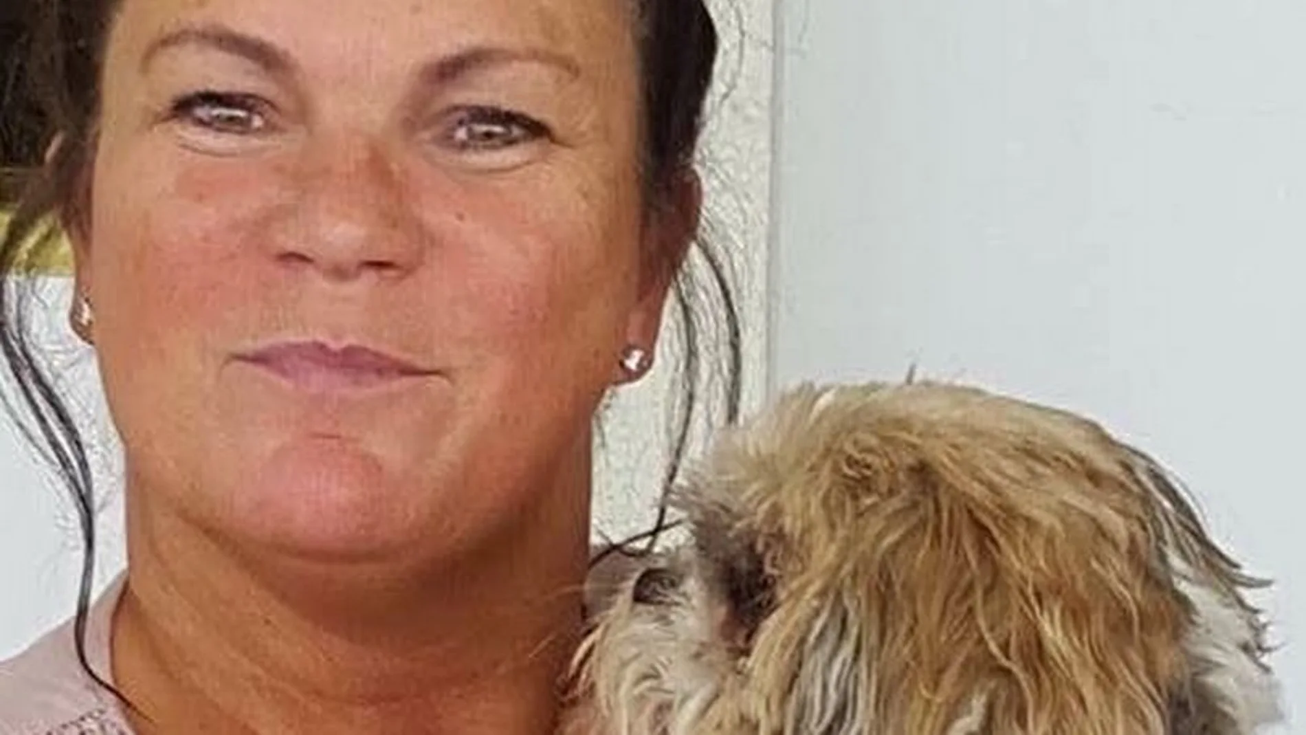 Mary Burguess con su perro Mary Burguess con su perro