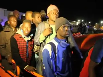 Frame 26.999329 de: Los 53 inmigrantes rescatados en alta mar han llegado al Puerto de Motril Frame 26.999329 de: Los 53 inmigrantes rescatados en alta mar han llegado al Puerto de Motril