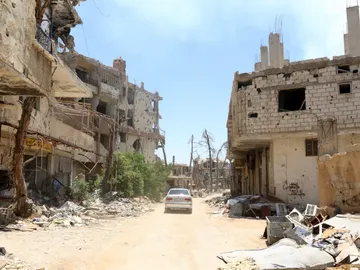 Vista de los daños registrados en algunos edificios, en la ciudad de Al Zabadani, recuperada por el ejército sirio al oeste de Damasco (Siria) Vista de los daños registrados en algunos edificios, en la ciudad de Al Zabadani, recuperada por el ejército sirio al oeste de Damasco (Siria)