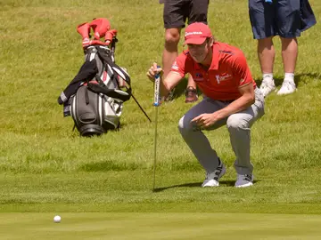 Bale, jugando al golf Bale, jugando al golf