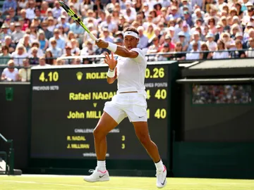 Rafa Nadal golpea un 'drive' en su debut en Wimbledon ante John Millman Rafa Nadal golpea un 'drive' en su debut en Wimbledon ante John Millman