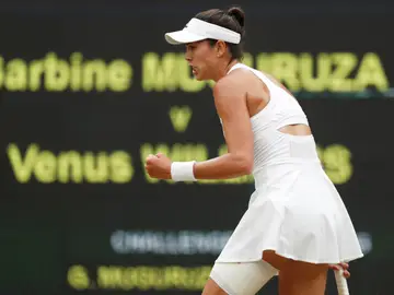 Garbiñe Muguruza celebra con el puño tras ganar el primer set a Venus Williams Garbiñe Muguruza celebra con el puño tras ganar el primer set a Venus Williams