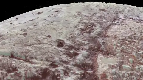 Espectacular vuelo sobre Plutón y Caronte Espectacular vuelo sobre Plutón y Caronte