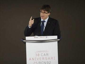 El presidente de la Generalitat, Carles Puigdemont, interviene en el el acto de la conmemoración del XXX Aniversario del CAR de Sant Cugat, un acto presidido por el Rey Felipe VI 