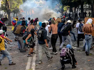 Manifestantes durante una protesta en Venezuela Manifestantes durante una protesta en Venezuela