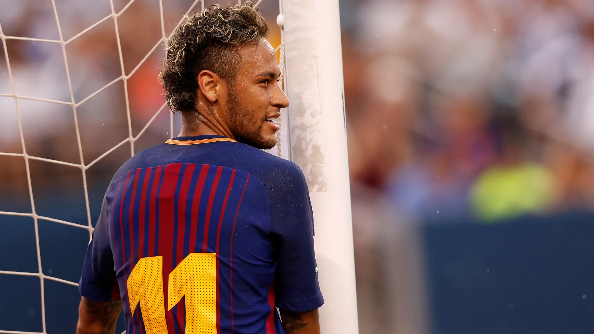 Neymar sonríe en un partido con el Barcelona Neymar sonríe en un partido con el Barcelona