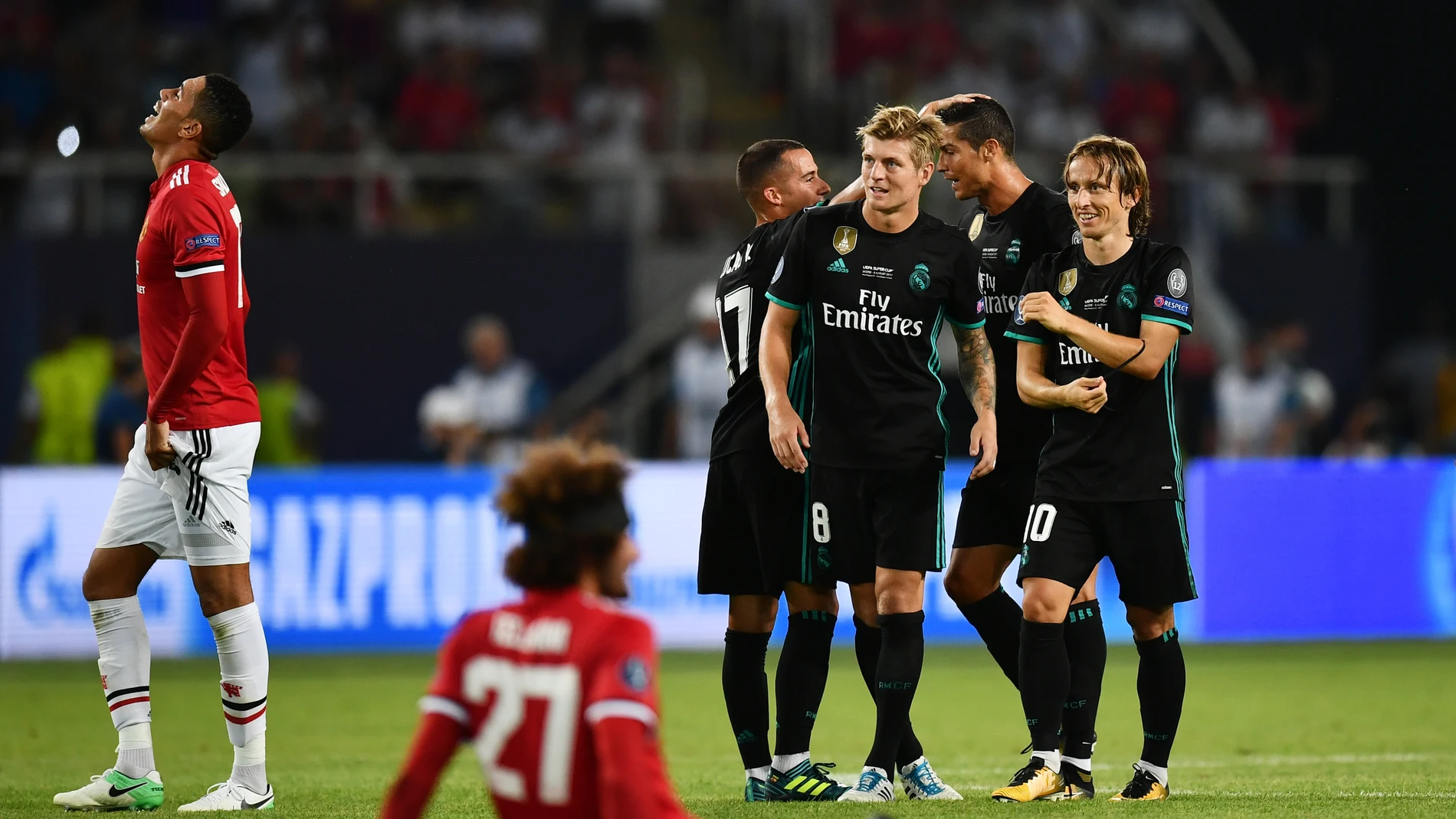 Los jugadores del Real Madrid celebran la victoria en la Supercopa de Europa