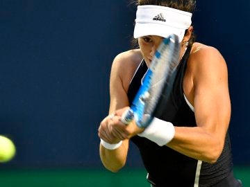 Garbiñe Muguruza, en acción ante Elina Svitolina