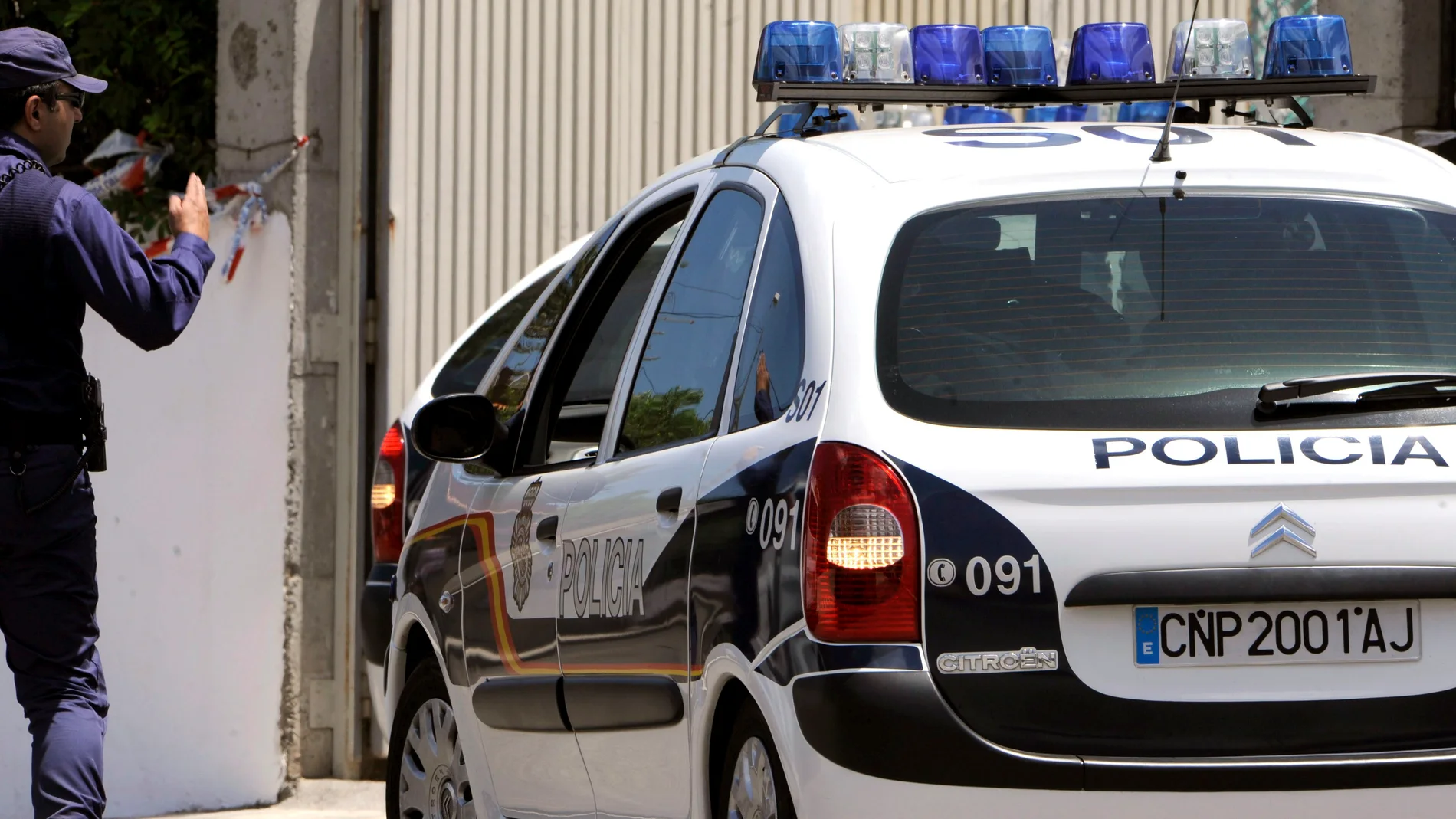 Un coche de la Policía Nacional en una imagen de archivo Un coche de la Policía Nacional en una imagen de archivo