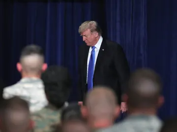 El presidente estadounidense Donald Trump en la base militar de Fort Myer, en Arlington, Virginia (Estados Unidos). El presidente estadounidense Donald Trump en la base militar de Fort Myer, en Arlington, Virginia (Estados Unidos).
