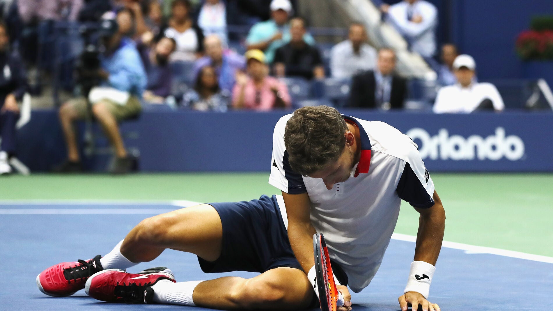 Pablo Carre&ntilde;o, en el suelo tras un punto en su partido contra Anderson